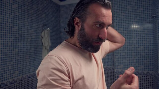 Young Person Brushing Teeth in a Bright Blue Tiled Bathroom