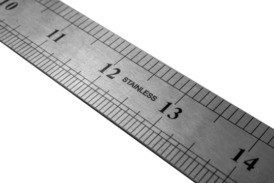 Stainless steel ruler is isolated, close up.