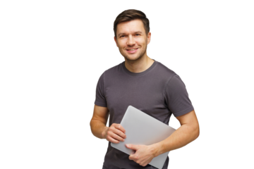 Man smiling while holding a laptop, showcasing confidence and readiness for work or study