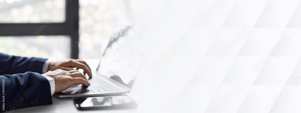 Poster closeup shot of hands of unrecognizable businessman in suit working on laptop while sitting at desk 