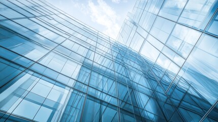 Modern glass office building facade, low angle view