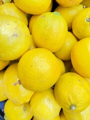 Pile of fresh yellow lemons