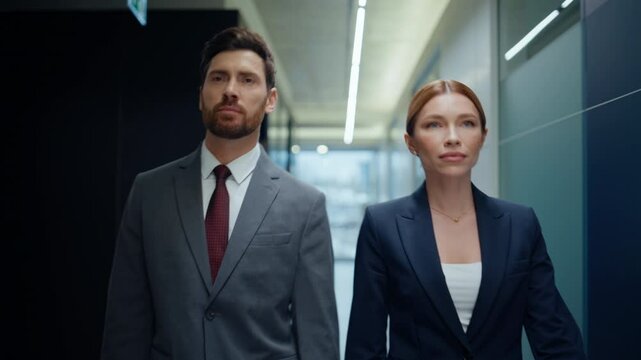Rich business people strolling vestibule closeup. Businessman pointing finger