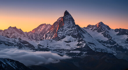 Obraz premium Matterhorn Peak at Sunrise Stunning Alpine Mountain Landscape with Clouds