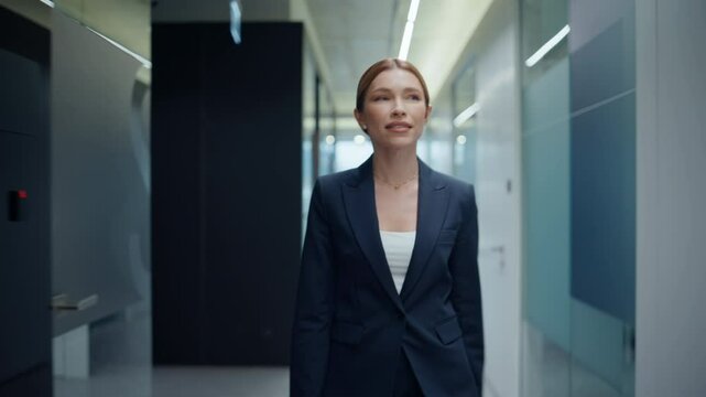 Confident employee strolling building hall rejoicing success jumping closeup