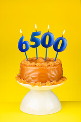 Candle number 6500 - Number of followers or likes.