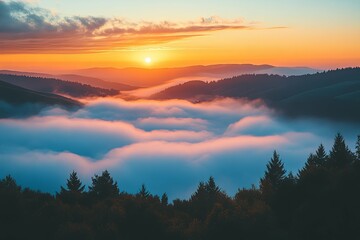 Obraz premium Majestic sunrise paints the sky above a mountain range with clouds