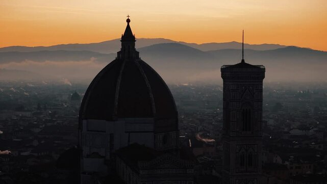 Close circular orbit around Florence Duomo dome in deep morning shadows