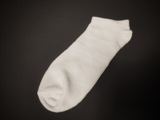 white socks on black background