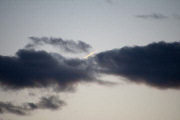 dark clouds at last light