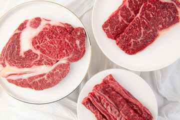 Close-up of Raw Steak with Marbling on a Plate
