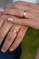 wedding rings on hands
