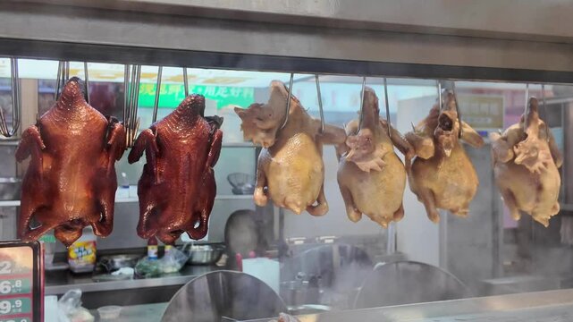 Fresh and steaming white-cut chicken and roast chicken in the roast and stew shop