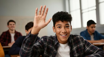 Hispanic teen male student raising hand in classroom with classmates