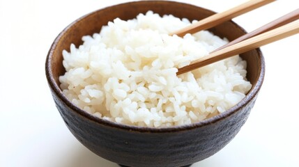 A Bowl of Steamed Rice with Chopsticks