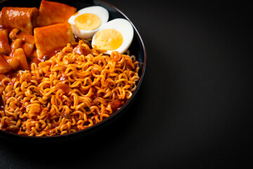 Korean instant noodles with Korean rice cake and fish cake and boiled egg