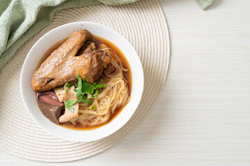 Braised duck noodles with brown soup