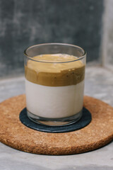 Dalgona coffee or whipped instant coffee. New popular food and drink trend. Trendy drink during Covid-19 city lock down and self quarantine, stay at home concept