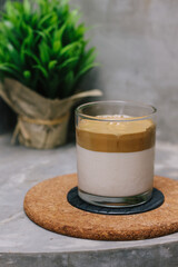 Dalgona coffee or whipped instant coffee. New popular food and drink trend. Trendy drink during Covid-19 city lock down and self quarantine, stay at home concept