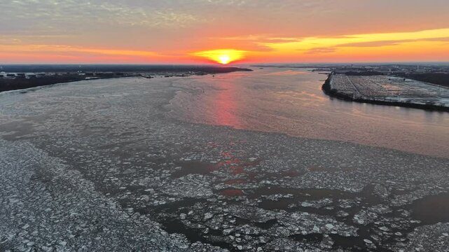 Aerial View of a Fire Sky Sunset over Frozen Delaware River
