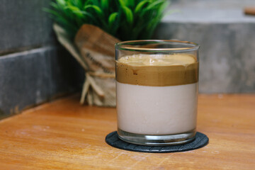 Dalgona coffee or whipped instant coffee. New popular food and drink trend. Trendy drink during Covid-19 city lock down and self quarantine, stay at home concept