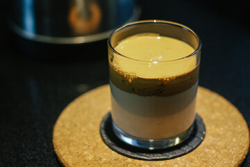 Dalgona coffee or whipped instant coffee. New popular food and drink trend. Trendy drink during Covid-19 city lock down and self quarantine, stay at home concept