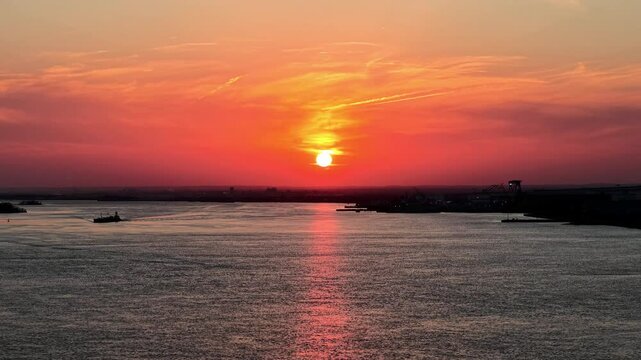 Aerial View of a Fire Sky Sunset over Delaware River
