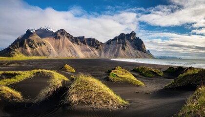 black sand dunes on the stokksnes headland on southeastern icelandic coast with vestrahorn batman mountain
