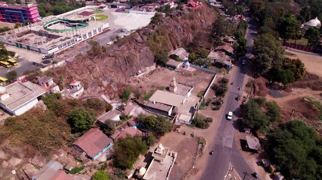 Ravi Dham Ashram with Jabalpur view point and Little World School at Tilwara ghat, jotpur, Jabalpur, Madhya Pradesh, india. day time, moving up, tilt down, drone shot, 4k.
