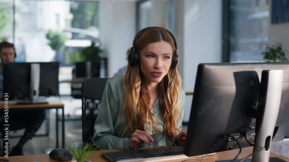 Poster advisor headset consulting customer looking at computer data at office closeup.