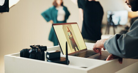 Laptop screen, photographer and editing in studio for creative, digital art or magazine project....