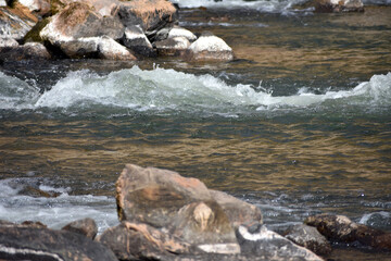Rio Chama river flowing over rocks in New Mexico