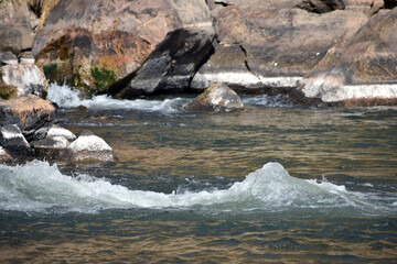 Rio Chama river flowing over rocks in New Mexico