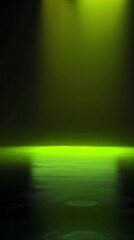 Green Illuminated Water with Ripples Creates a Serene Abstract Background