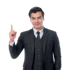 Confident young businessman in a sleek black suit pointing upwards with a friendly smile, conveying a successful business idea or innovative solution, isolated on a transparent background