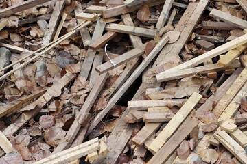 Waste heap of old used wood plank
