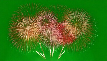 Fototapeta premium Glowing Fireworks Blast with Fiery Sparks Isolated on Green Screen 
