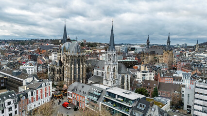 Aachen city skyline aerial drone view from above, cityscape with Aachen Cathedral and Katschhof square, Germany