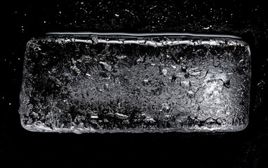 Large ice block with detailed texture displayed against a dark background highlighting its unique formation and clarity