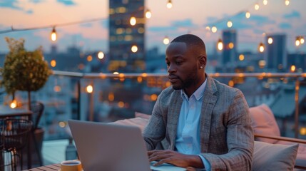 Freelancing at sunset: A business nomad works from a rooftop cafe with a view of the city skyline