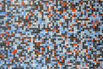 Background from a wall of colorful mosaic tiles