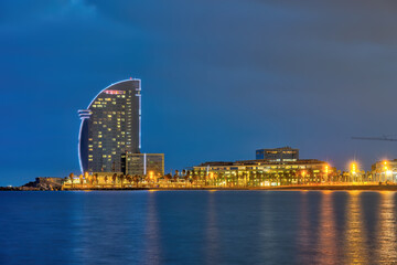 Obraz premium Barceloneta beach in Barcelona, Spain, at blue hour