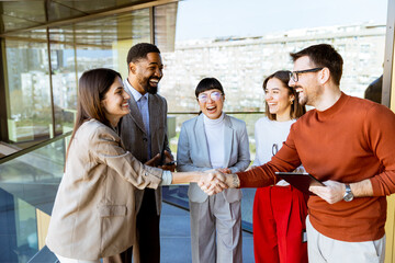 Networking and collaboration flourishes during a business meeting in a modern office setting