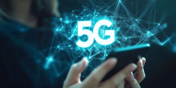5G text sign in hand with smartphone on dark background - Powered by Adobe