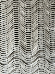 Background of old asbestos curve cement. Slate wavy asbestos stacked texture. Roof tiles