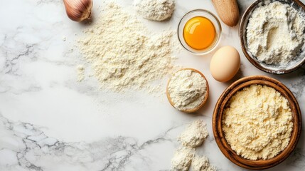 Fototapeta premium Baking Ingredients Flat Lay Flour, Eggs, and More on Marble Surface