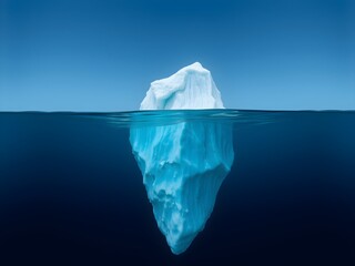Obraz premium Iceberg in the ocean with a view under water. Crystal clear water. Hidden Danger And Global Warming Concept.
