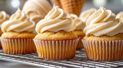 Vanilla baking desert delight. Delicious cupcakes with swirls of creamy frosting on a cooling rack.
