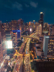 Fototapeta premium Night Cityscape with Busy Traffic and Illuminated Skyscrapers in Jakarta 