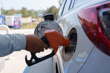 Close-up of petrol and diesel fuel dispensers at a pump.	